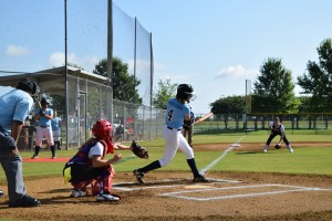 Ashlyn McKeown strokes a double to the centerfield fence against Alexandria LA Photo by Bruce Branum    