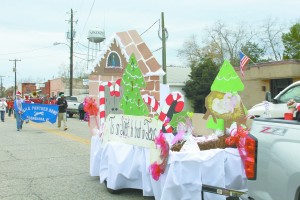 The Town of McKenzie held their annual Christmas parade on Saturday. Awards were givento the top three floats. First place was awarded to McKenzie United Methodist Church, second to Sweet Home Baptist Church and third was awarded to Welcome Home Baptist Church. Pictured above is the McKenzie United Methodist Church's float, "Tis so Sweet to Trust in Jesus." (Tori Norris/The Standard)