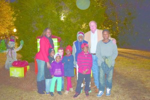 Greenville Mayor Dexter McLendon poses for a picture with Angela Kelley, friends and family. (Bruce Branum/The Standard)